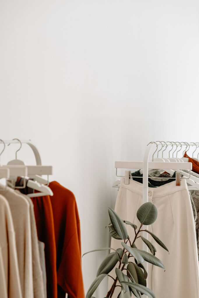 closet rack showing tailored clothing options for how to be an elegant woman